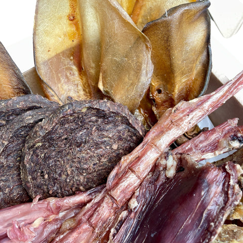 Three chunky beef quarter pounder chews, perfect for large dogs and strong chewers.