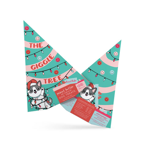 Dog treat packaging shaped like a Christmas tree with cartoon dogs and festive design.