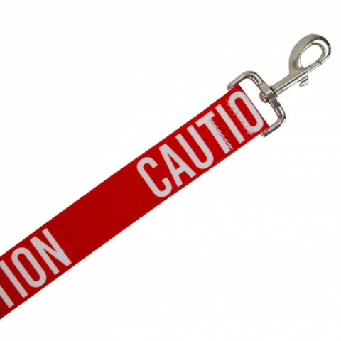 Red dog leash with 'CAUTION' text on a white background