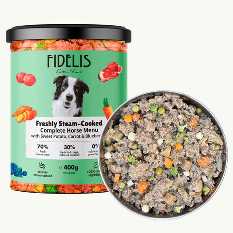 Fidelis Freshly Steam-Cooked Horse Dog Food 400g tub beside a bowl of chunky horse with sweet potato, carrot and blueberries
