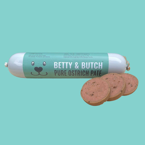 Betty & Butch pure ostrich pate packaging with slices on a teal background