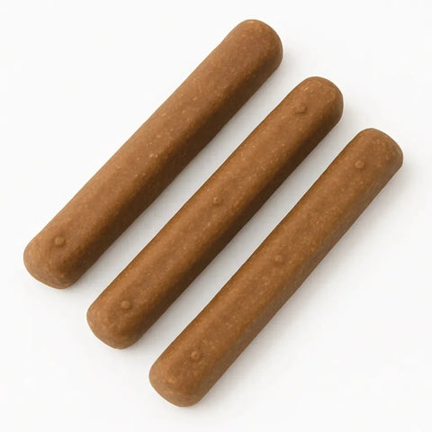 Natural dog chews made from casein protein, shown in stick form. Ideal for dogs of all sizes.