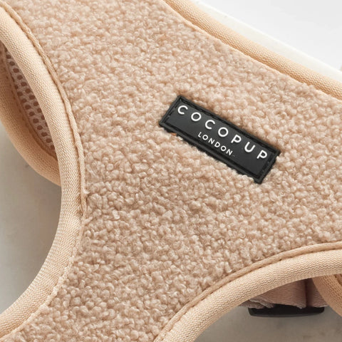 Beige pet harness with 'Cocopup London' label on a light background