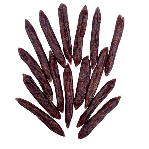 natural dog sausage treats arranged
