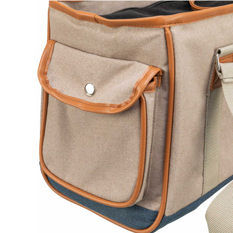 Beige pet carrier with brown trim on a white background